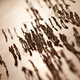 Illustration for article titled Mysterious, tiny human figures march across a wall